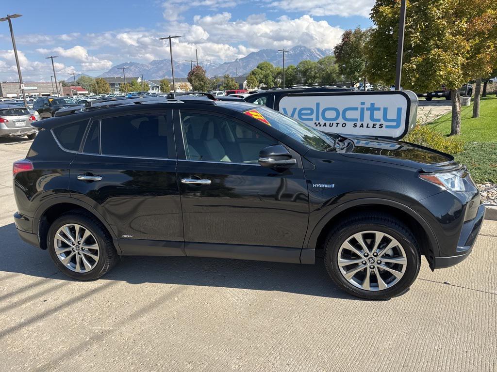 used 2018 Toyota RAV4 Hybrid car, priced at $29,995