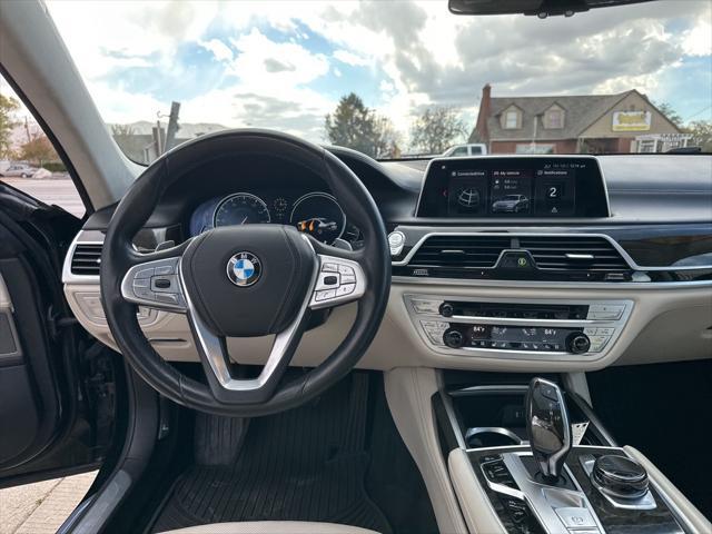 used 2018 BMW 750 car, priced at $29,995