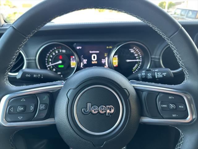 used 2023 Jeep Wrangler 4xe car, priced at $33,999