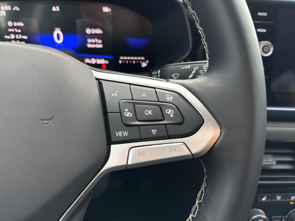 used 2024 Volkswagen Taos car, priced at $20,995