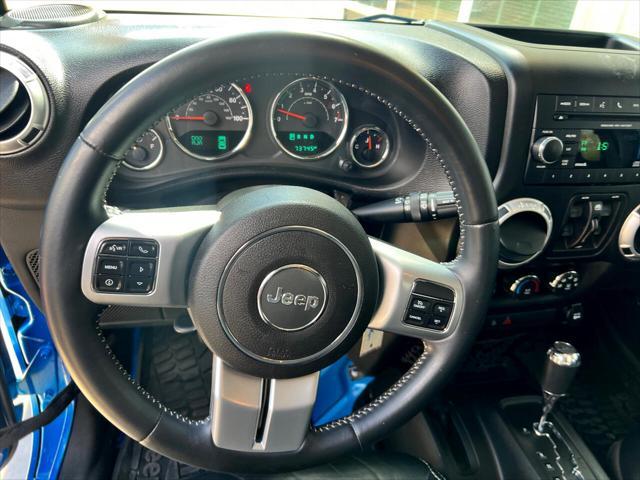 used 2015 Jeep Wrangler Unlimited car, priced at $24,595