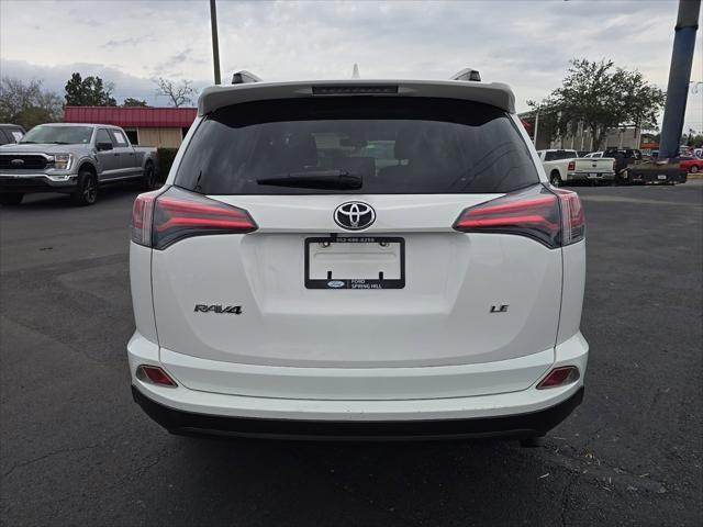 used 2018 Toyota RAV4 car, priced at $19,451