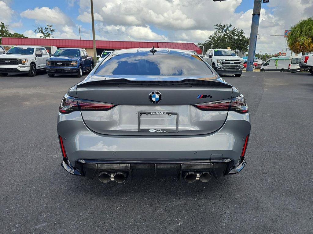 used 2022 BMW M4 car, priced at $64,074