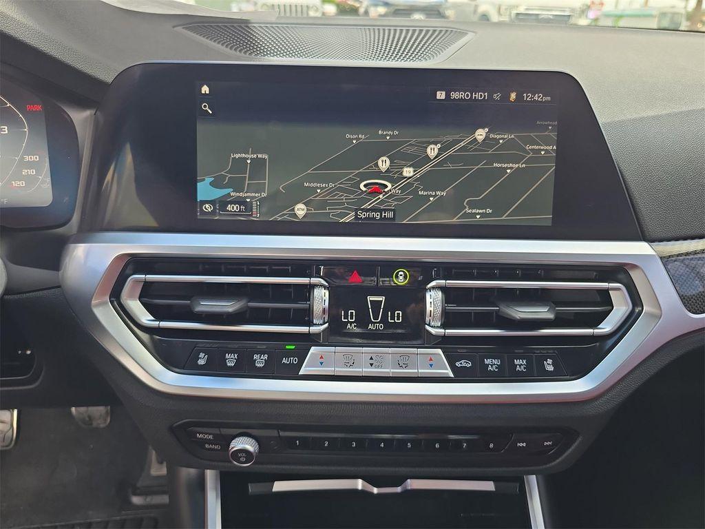 used 2022 BMW M4 car, priced at $64,074