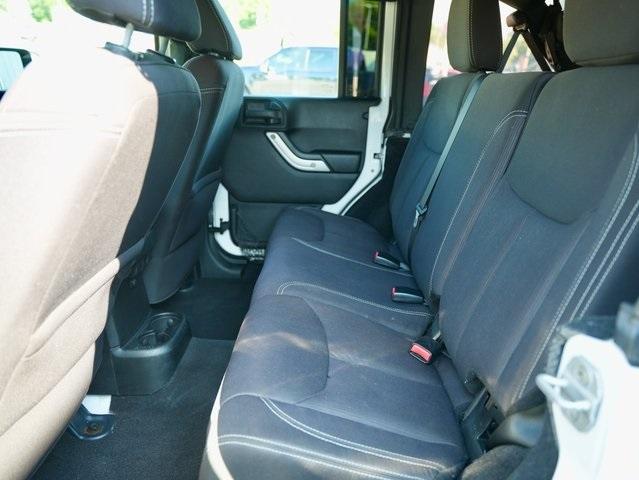 used 2013 Jeep Wrangler Unlimited car, priced at $16,392