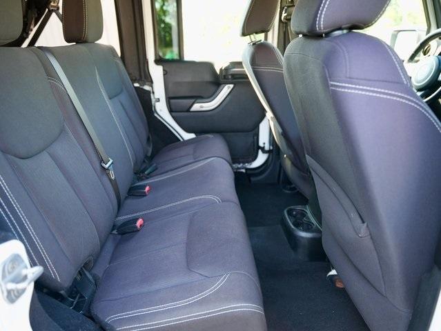 used 2013 Jeep Wrangler Unlimited car, priced at $16,392