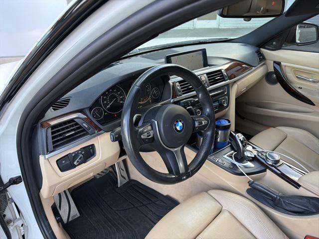 used 2015 BMW 335 car, priced at $14,797