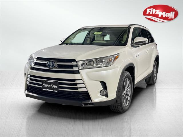 used 2019 Toyota Highlander Hybrid car, priced at $31,995