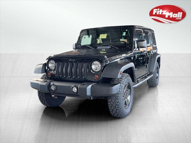 used 2012 Jeep Wrangler Unlimited car, priced at $18,595