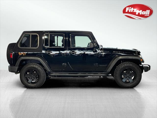 used 2012 Jeep Wrangler Unlimited car, priced at $18,595