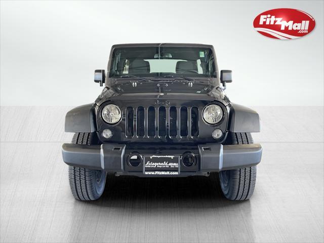 used 2014 Jeep Wrangler Unlimited car, priced at $16,295