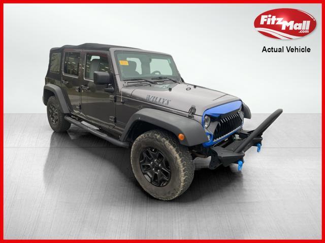 used 2014 Jeep Wrangler Unlimited car, priced at $16,395