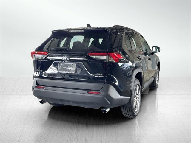 used 2024 Toyota RAV4 Hybrid car, priced at $33,995