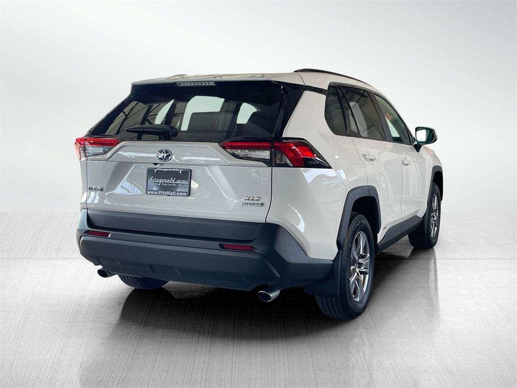 used 2024 Toyota RAV4 Hybrid car, priced at $33,395