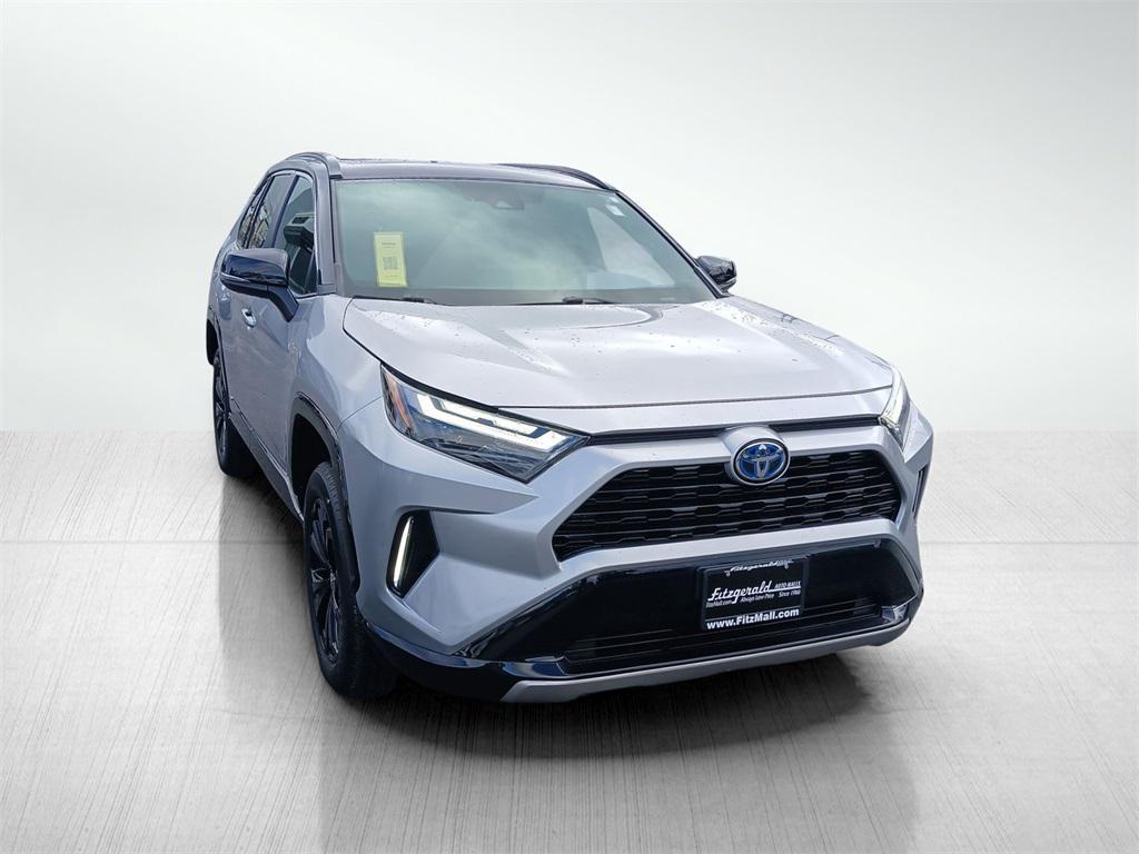 used 2022 Toyota RAV4 Hybrid car, priced at $34,995