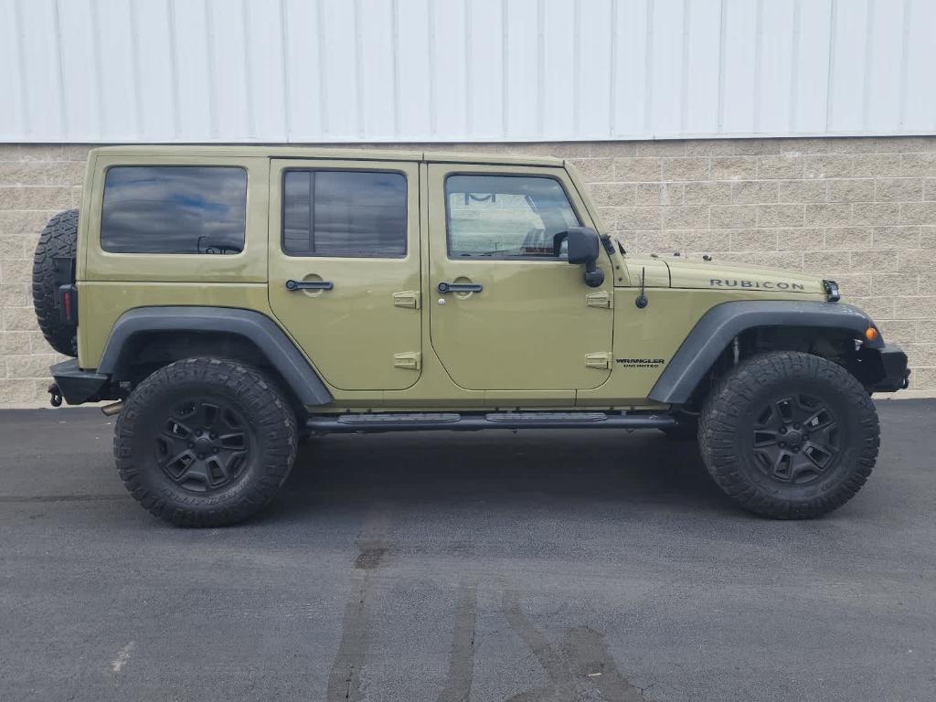 used 2013 Jeep Wrangler Unlimited car, priced at $16,990