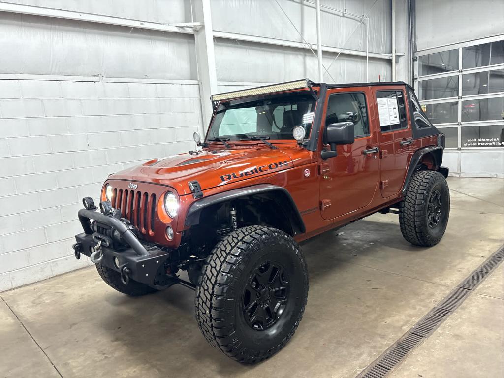 used 2014 Jeep Wrangler Unlimited car, priced at $18,897