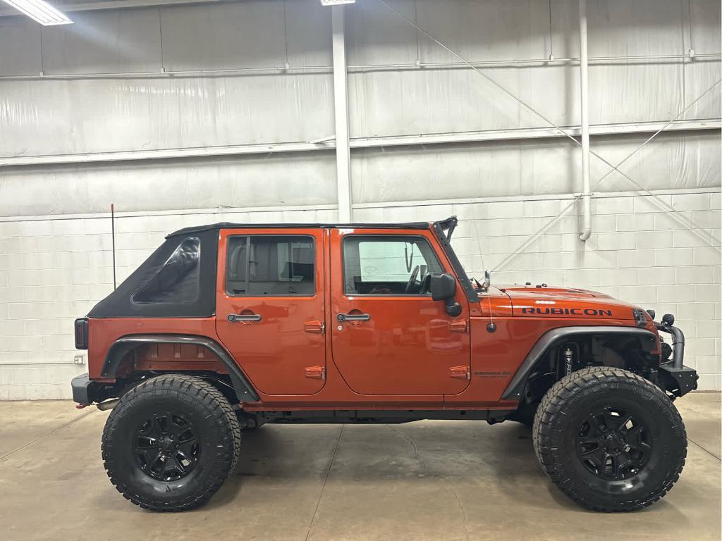 used 2014 Jeep Wrangler Unlimited car, priced at $18,897