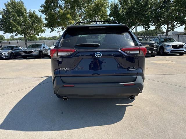 used 2021 Toyota RAV4 Hybrid car, priced at $27,075