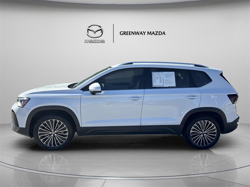 used 2025 Volkswagen Taos car, priced at $23,154