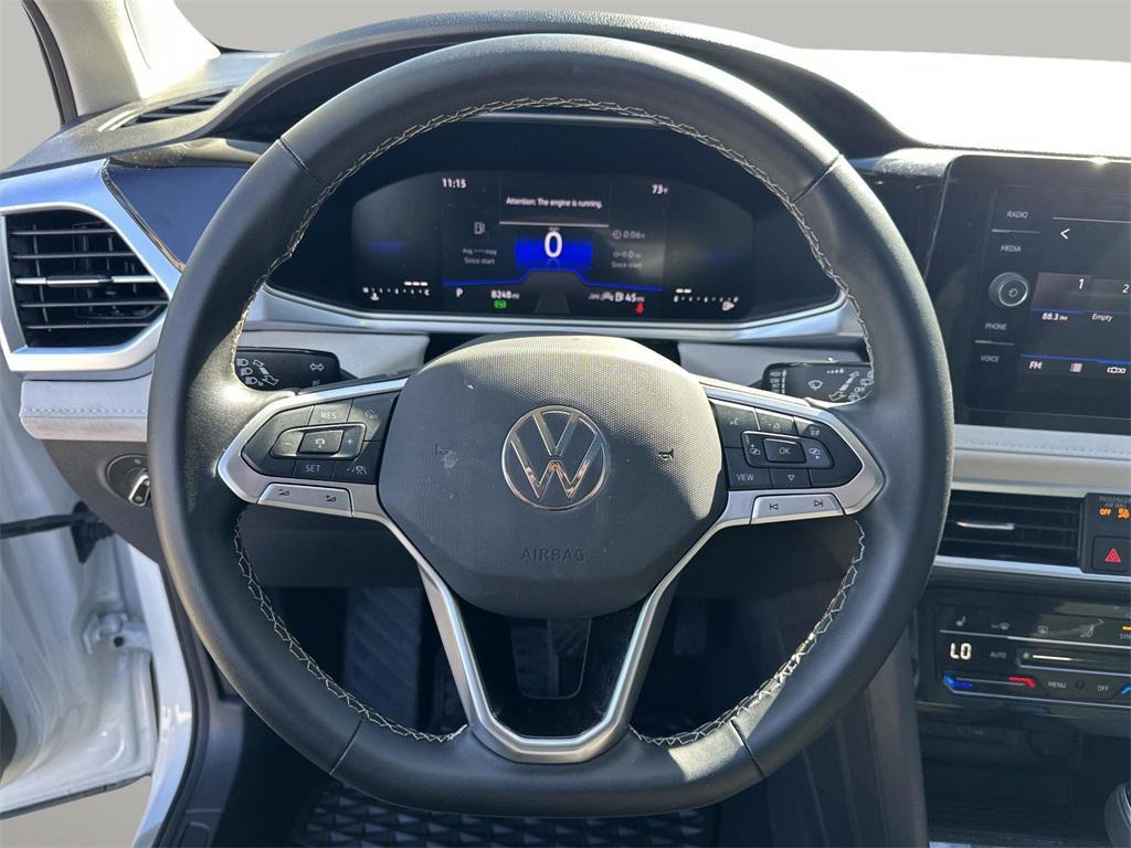 used 2025 Volkswagen Taos car, priced at $23,154