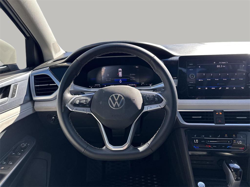 used 2025 Volkswagen Taos car, priced at $23,154