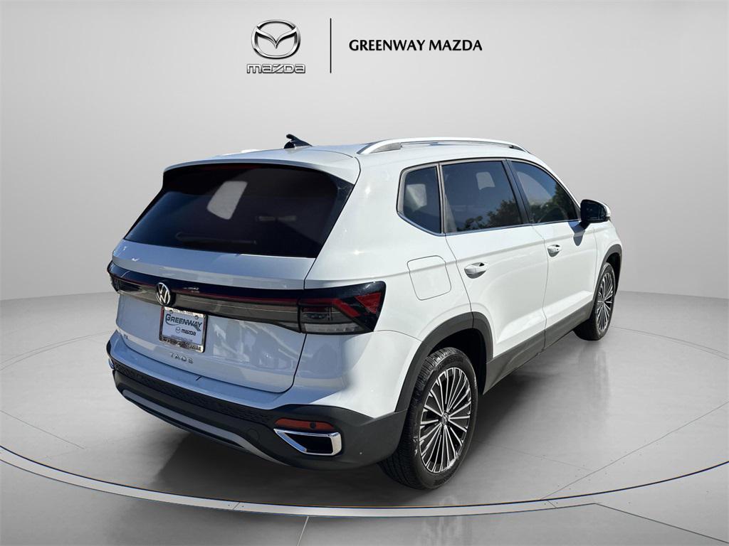 used 2025 Volkswagen Taos car, priced at $23,154