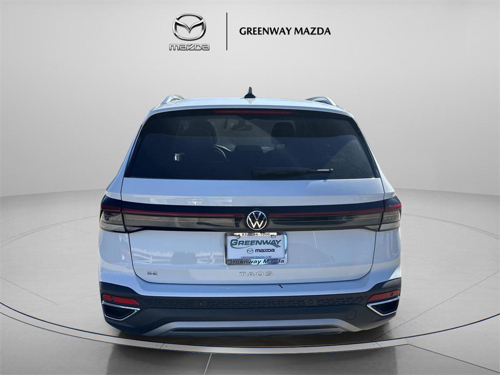 used 2025 Volkswagen Taos car, priced at $23,154