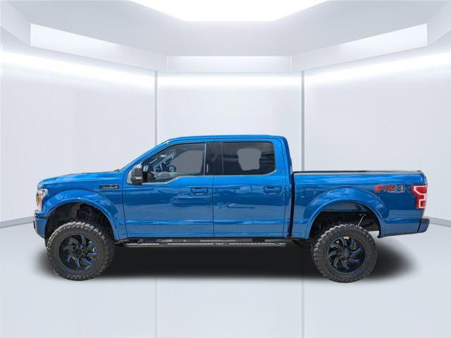 used 2018 Ford F-150 car, priced at $25,310