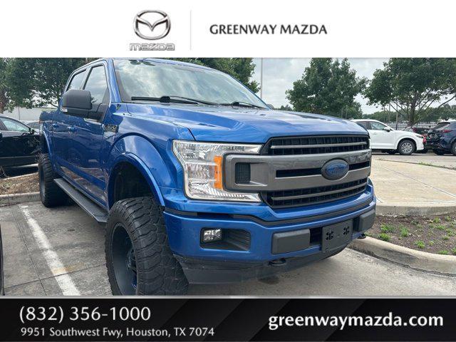 used 2018 Ford F-150 car, priced at $25,590