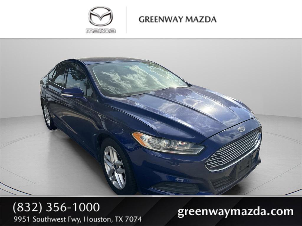 used 2015 Ford Fusion car, priced at $7,998