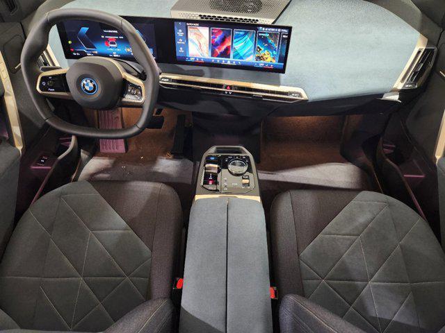 new 2025 BMW iX car, priced at $98,855