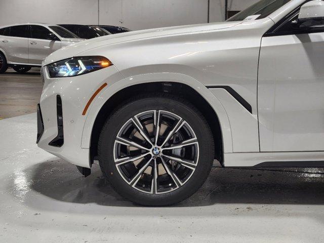 new 2025 BMW X6 car, priced at $85,475