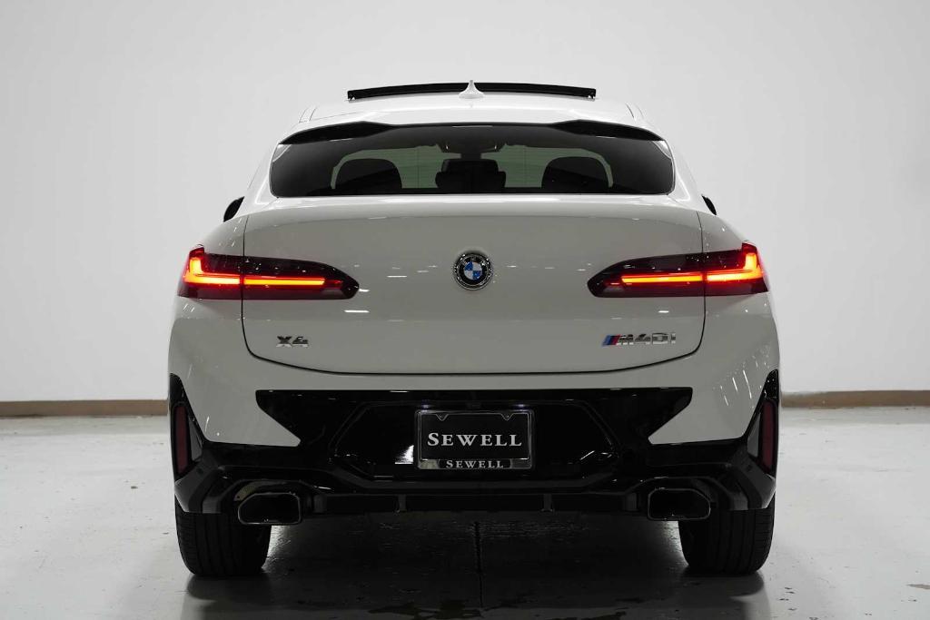 used 2025 BMW X4 car, priced at $65,988