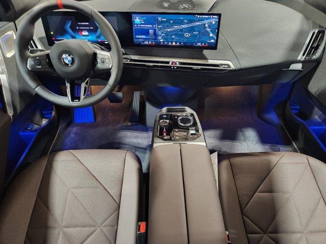 new 2025 BMW iX car, priced at $117,295