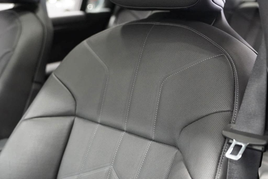 used 2024 BMW 740 car, priced at $77,434