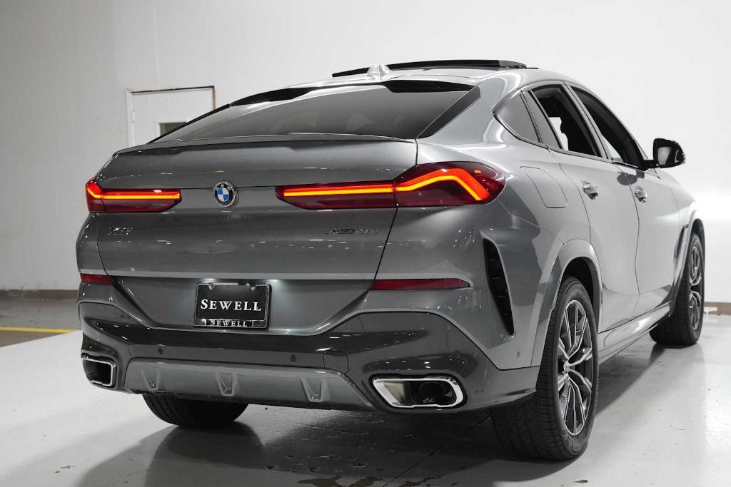 used 2025 BMW X6 car, priced at $76,988