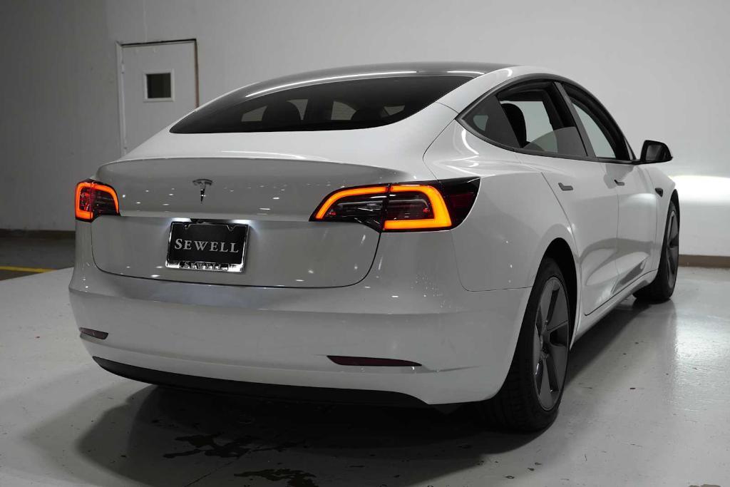 used 2023 Tesla Model 3 car, priced at $27,988