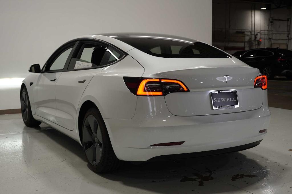 used 2023 Tesla Model 3 car, priced at $27,988