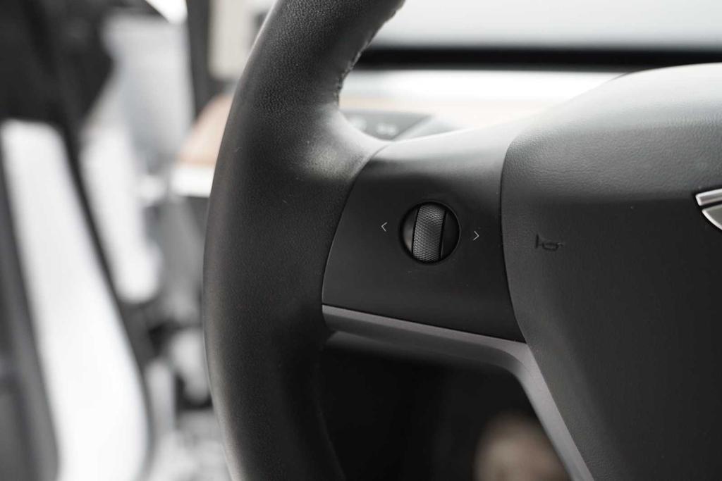 used 2023 Tesla Model 3 car, priced at $27,988