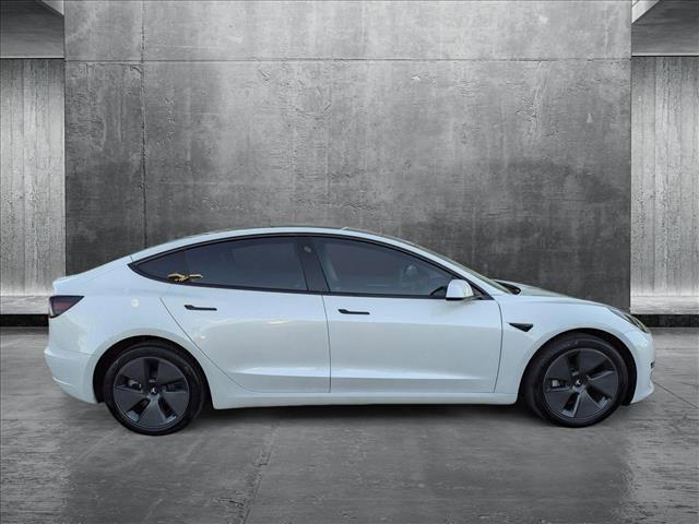 used 2023 Tesla Model 3 car, priced at $27,955