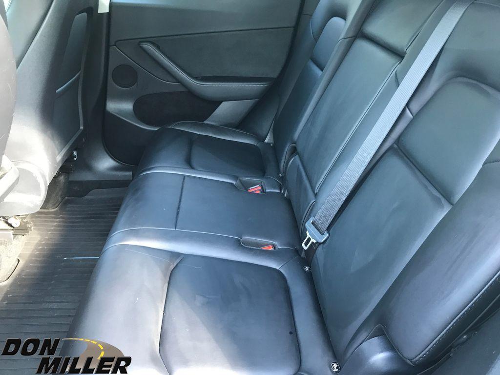used 2023 Tesla Model Y car, priced at $30,880