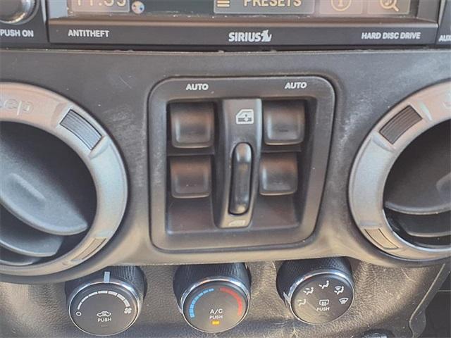 used 2014 Jeep Wrangler Unlimited car, priced at $16,488