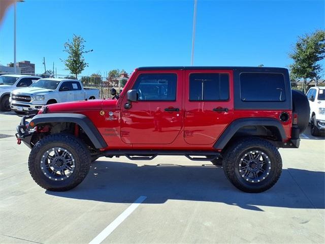 used 2014 Jeep Wrangler Unlimited car, priced at $16,488