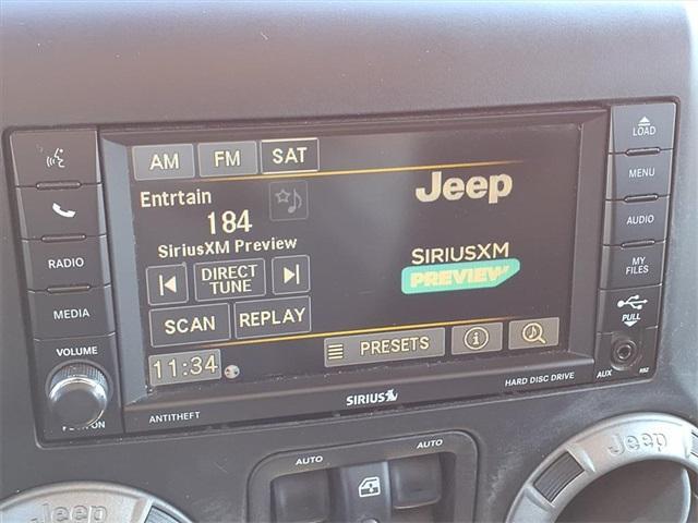 used 2014 Jeep Wrangler Unlimited car, priced at $16,488