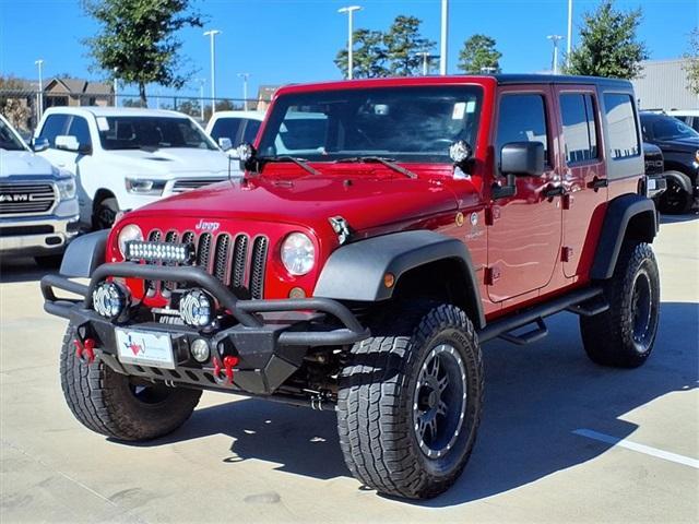 used 2014 Jeep Wrangler Unlimited car, priced at $16,488