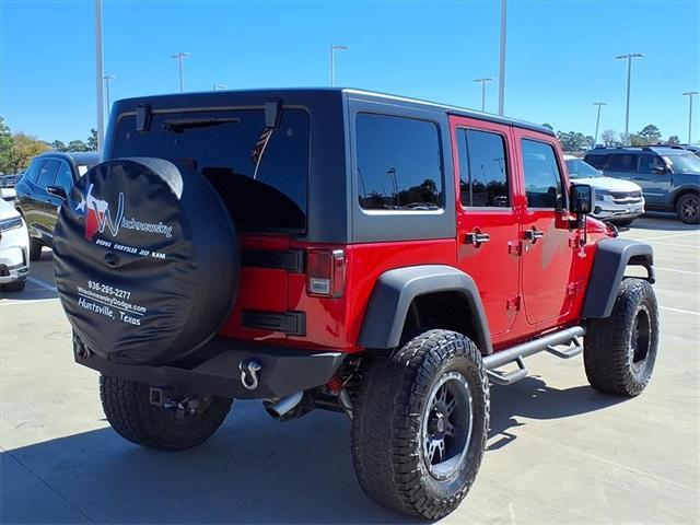 used 2014 Jeep Wrangler Unlimited car, priced at $16,488