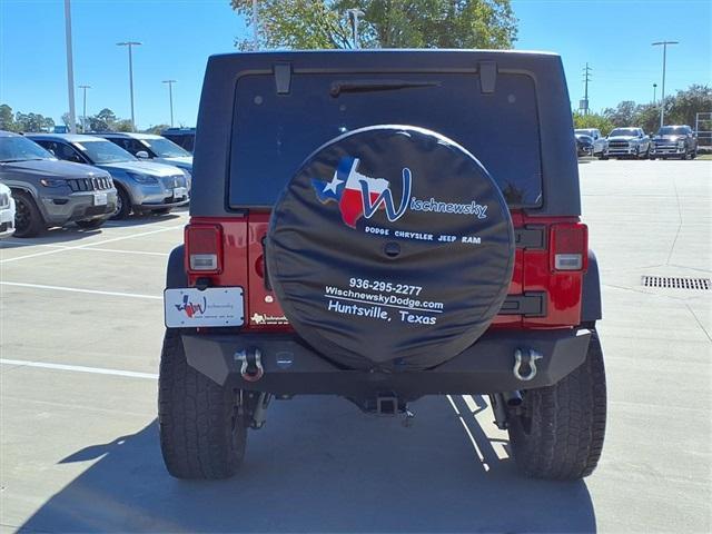 used 2014 Jeep Wrangler Unlimited car, priced at $16,488