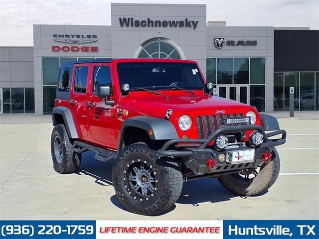 used 2014 Jeep Wrangler Unlimited car, priced at $16,488