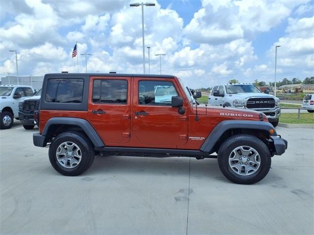 used 2014 Jeep Wrangler Unlimited car, priced at $22,079